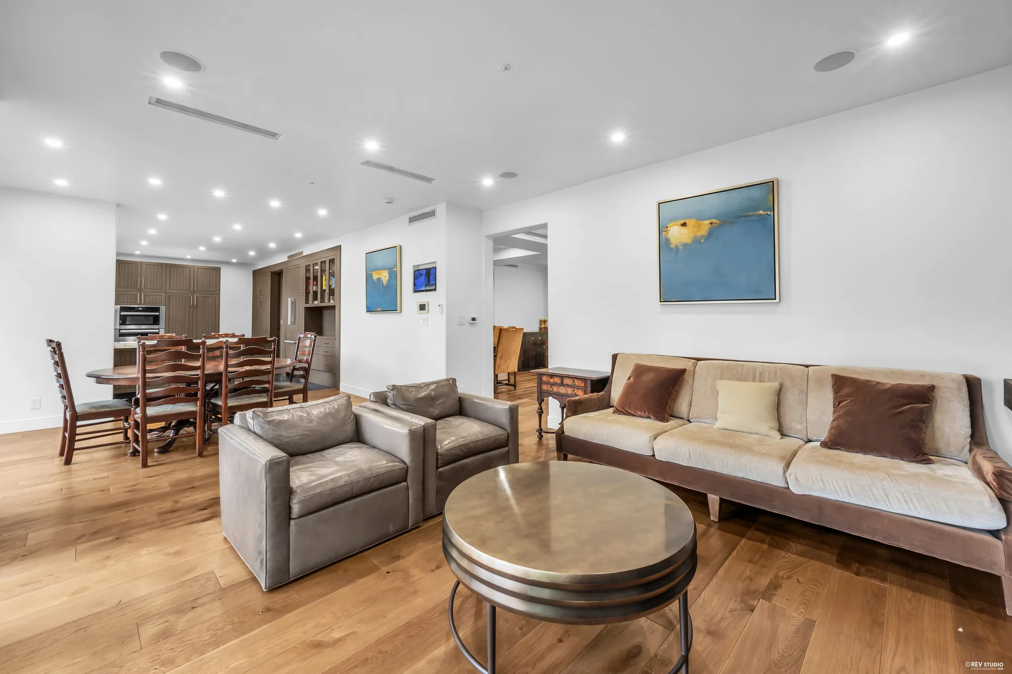 The family room and the breakfast nook in one frame