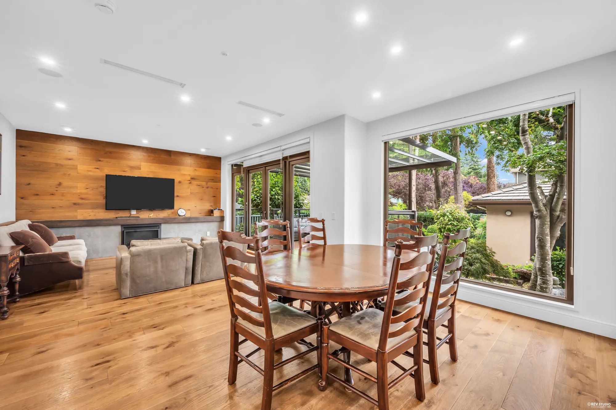 The nook toward the family room, the wood wall and the deck doors